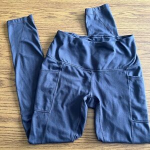 Purple Reebok leggings with pockets